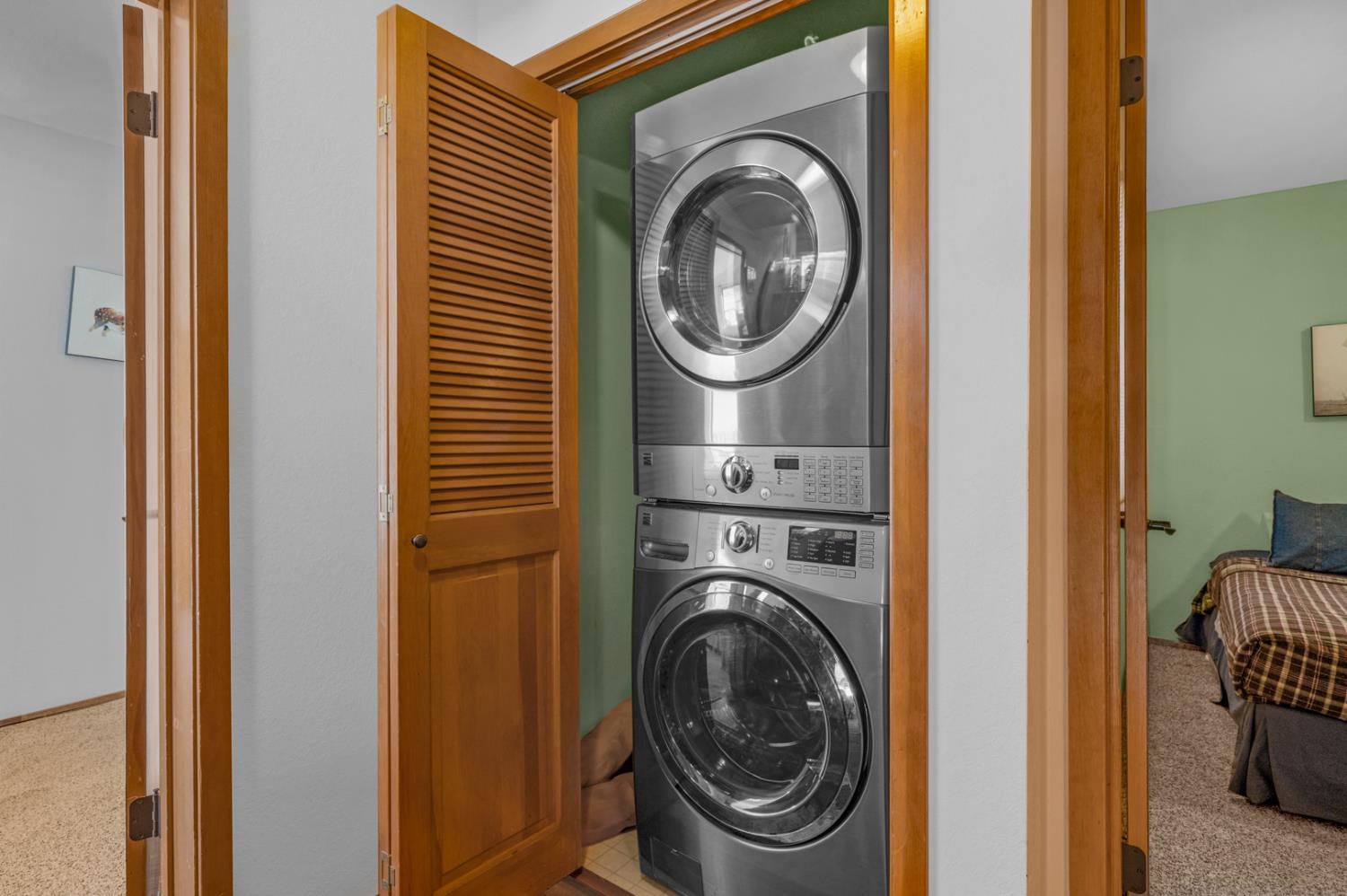 63215 Huntington Vista Road, Unit 80 Mono Hot Springs, CA 93642 - Photo 22 of 58 a view of a hallway with washer and dryer