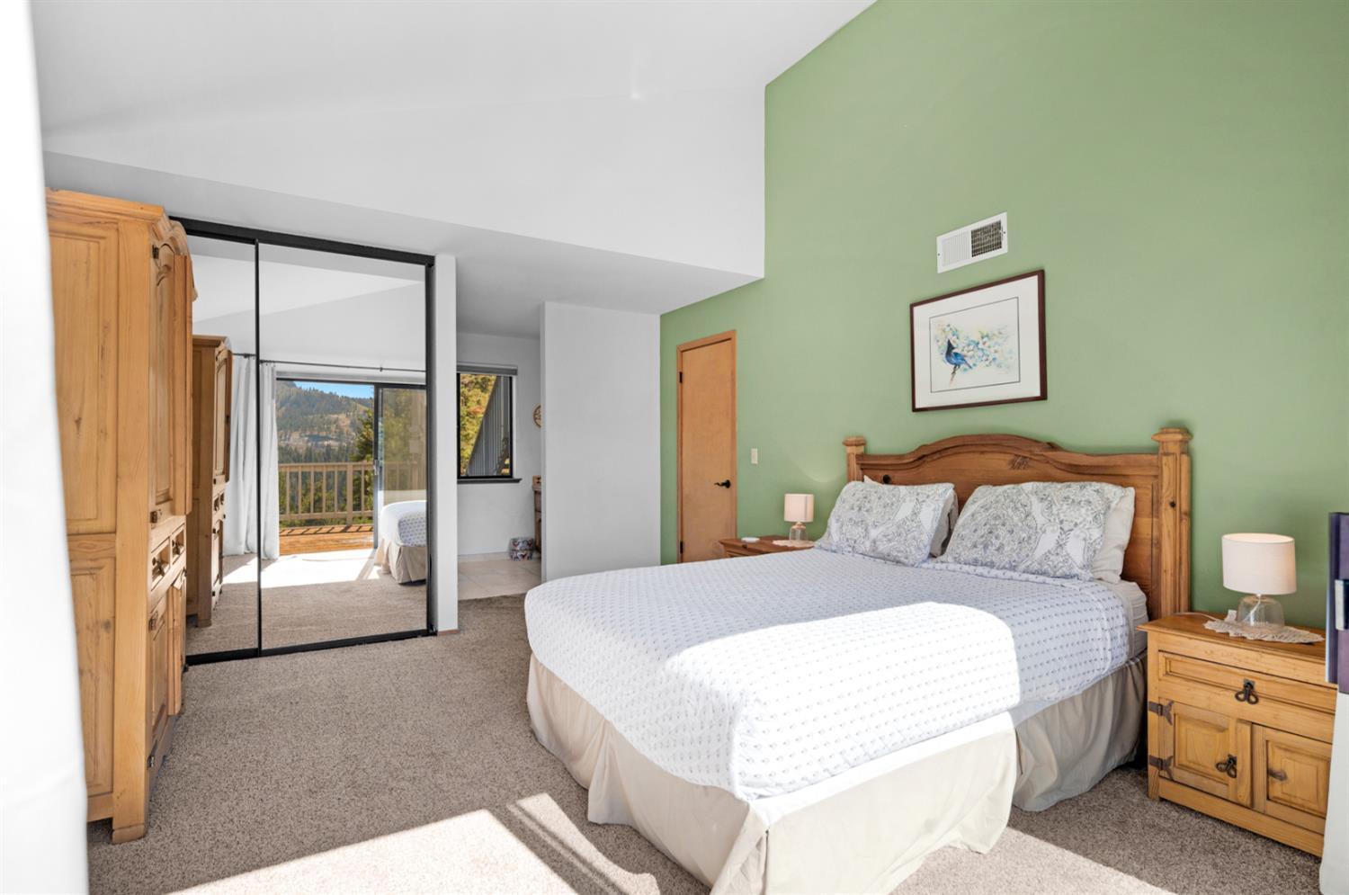 63215 Huntington Vista Road, Unit 80 Mono Hot Springs, CA 93642 - Photo 27 of 58 a spacious bedroom with a bed and a large window