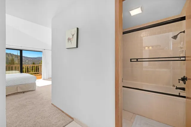 a view of entryway with wooden floor and stairs