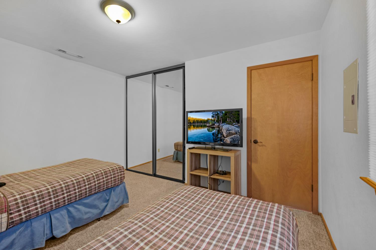 63215 Huntington Vista Road, Unit 80 Mono Hot Springs, CA 93642 - Photo 32 of 58 a bedroom with a bed and a dresser