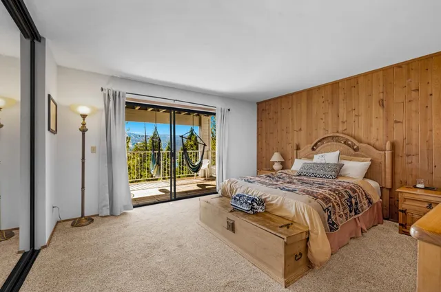 a bathroom with a sink vanity and a mirror