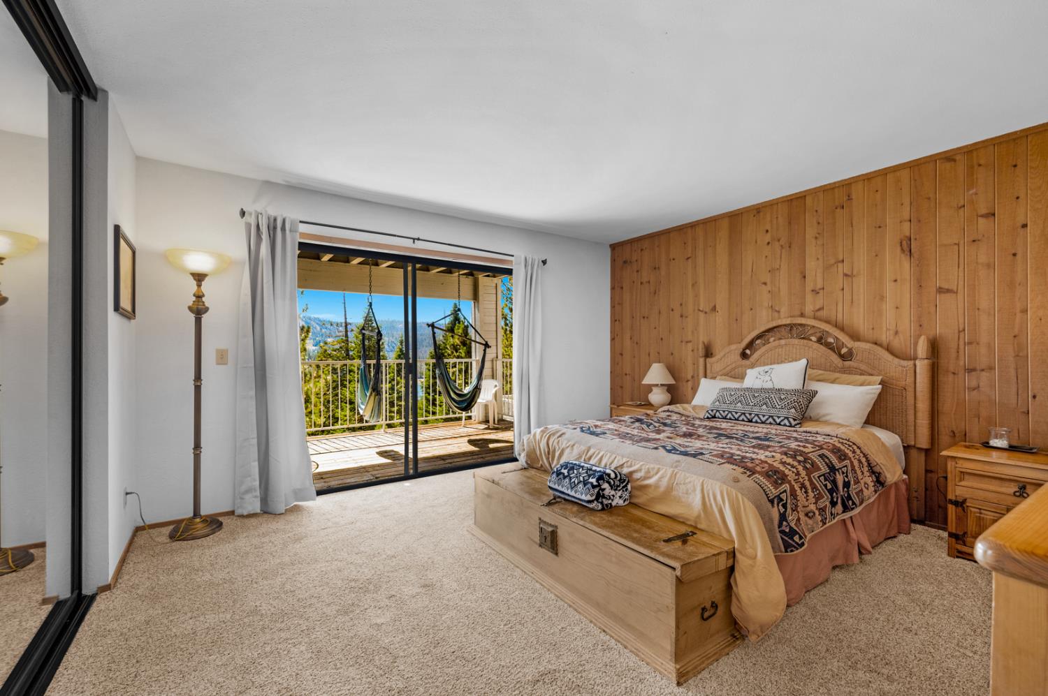 63215 Huntington Vista Road, Unit 80 Mono Hot Springs, CA 93642 - Photo 35 of 58 a bed sitting in a spacious bedroom next to a window