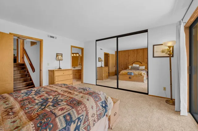 a balcony view with a seating space