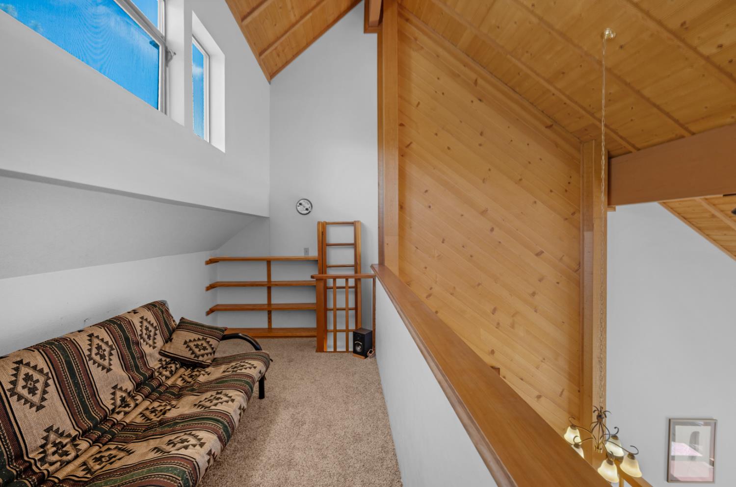 63215 Huntington Vista Road, Unit 80 Mono Hot Springs, CA 93642 - Photo 42 of 58 a view of a bedroom with furniture and stairs