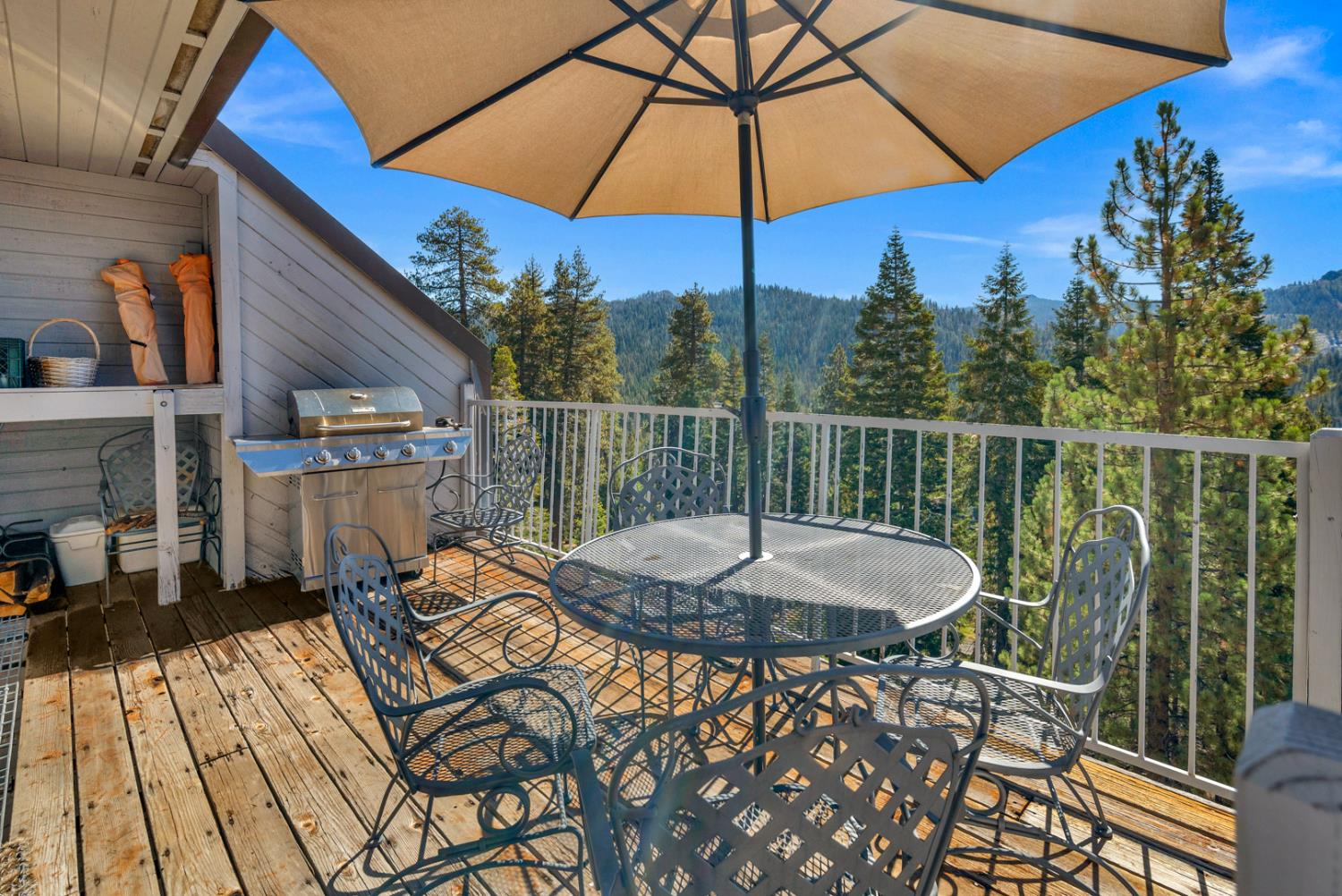 63215 Huntington Vista Road, Unit 80 Mono Hot Springs, CA 93642 - Photo 46 of 58 a view of a chair and table on the deck