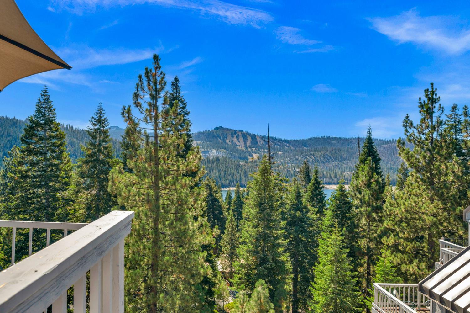63215 Huntington Vista Road, Unit 80 Mono Hot Springs, CA 93642 - Photo 48 of 58 a view of a city from a balcony