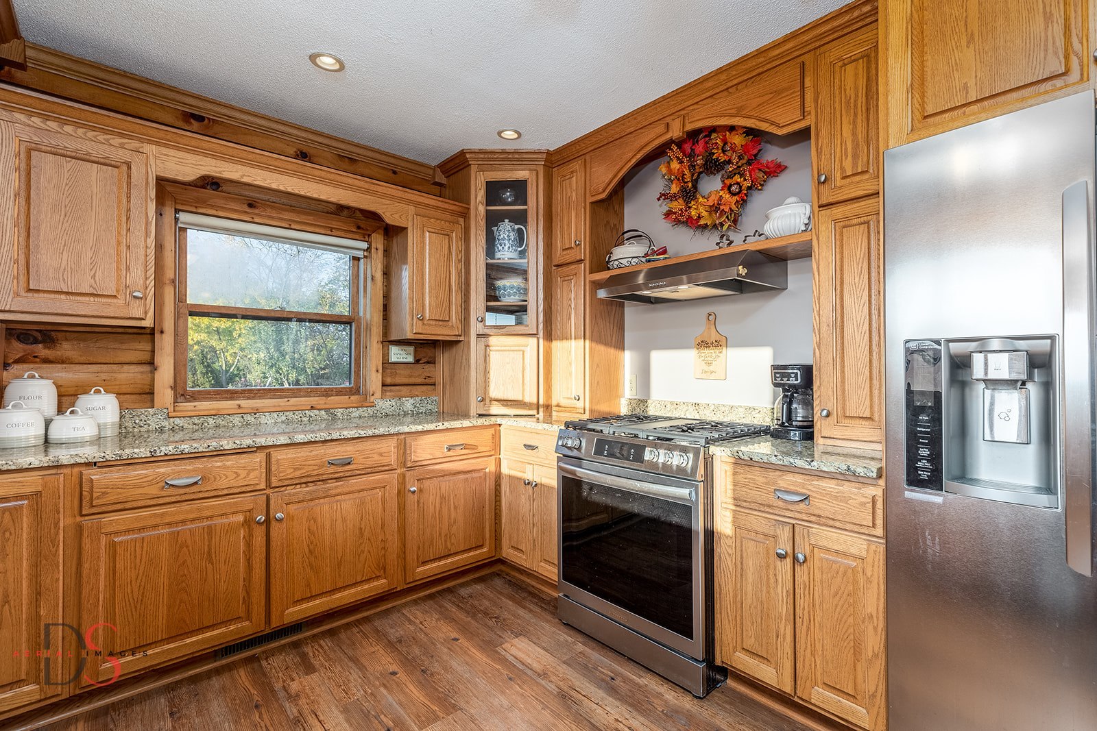 7920 Old Stage Road Morris, IL 60450 - Photo 14 of 43 a kitchen with stainless steel appliances granite countertop a stove and cabinets