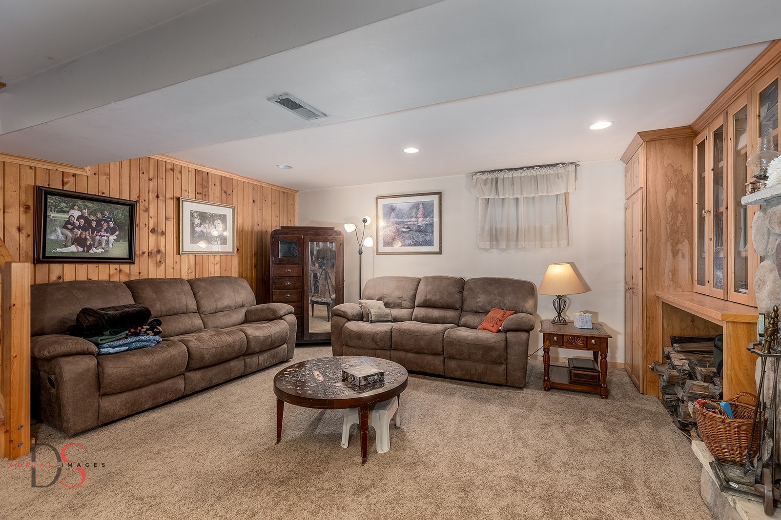 7920 Old Stage Road Morris, IL 60450 - Photo 27 of 43 a living room with furniture a fireplace and a large window