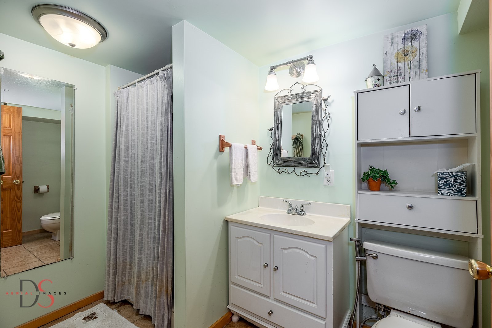 7920 Old Stage Road Morris, IL 60450 - Photo 29 of 43 a bathroom with a sink vanity and mirror