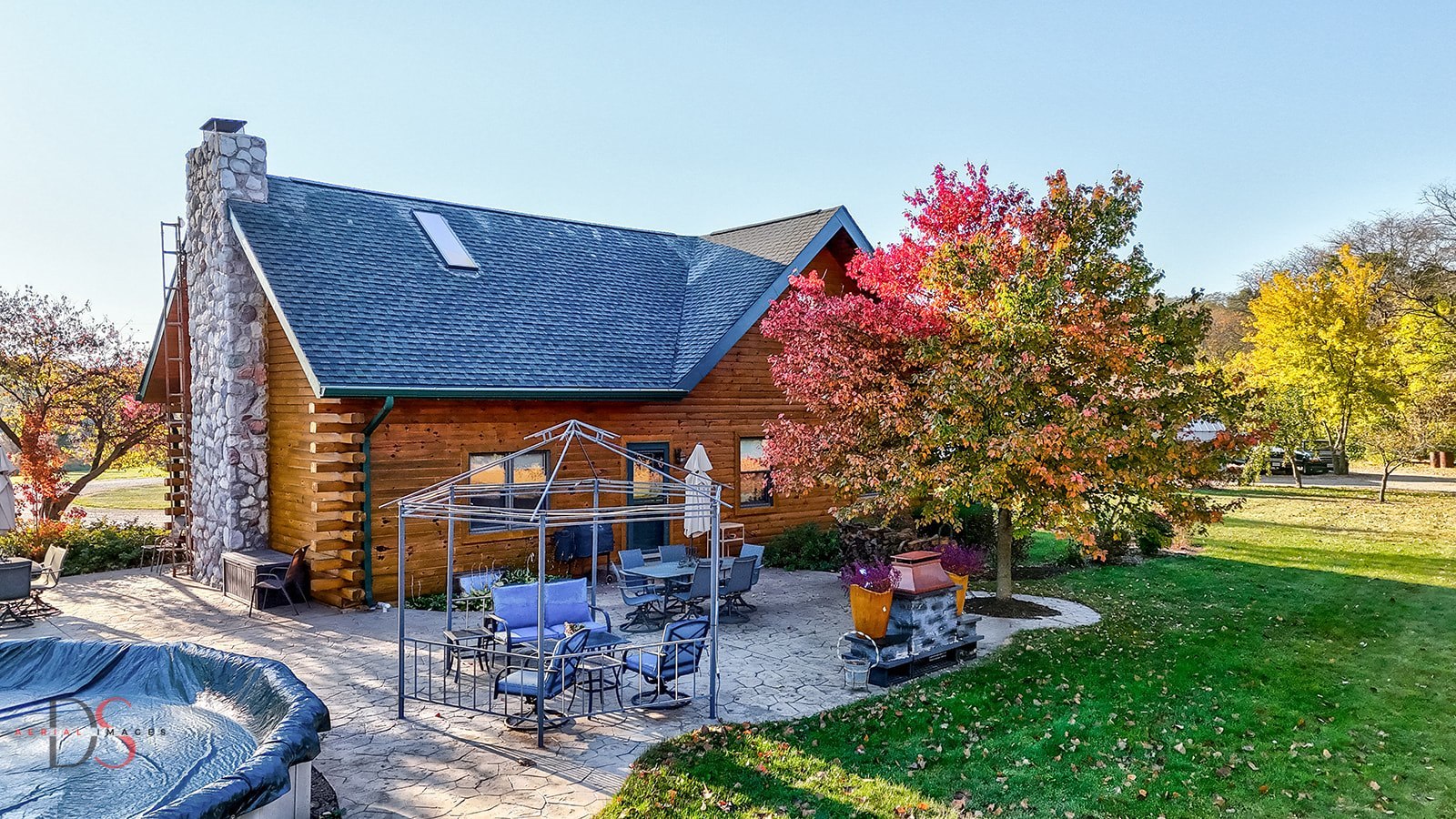 7920 Old Stage Road Morris, IL 60450 - Photo 6 of 43 a view of a patio with table and chairs potted plants and a large tree