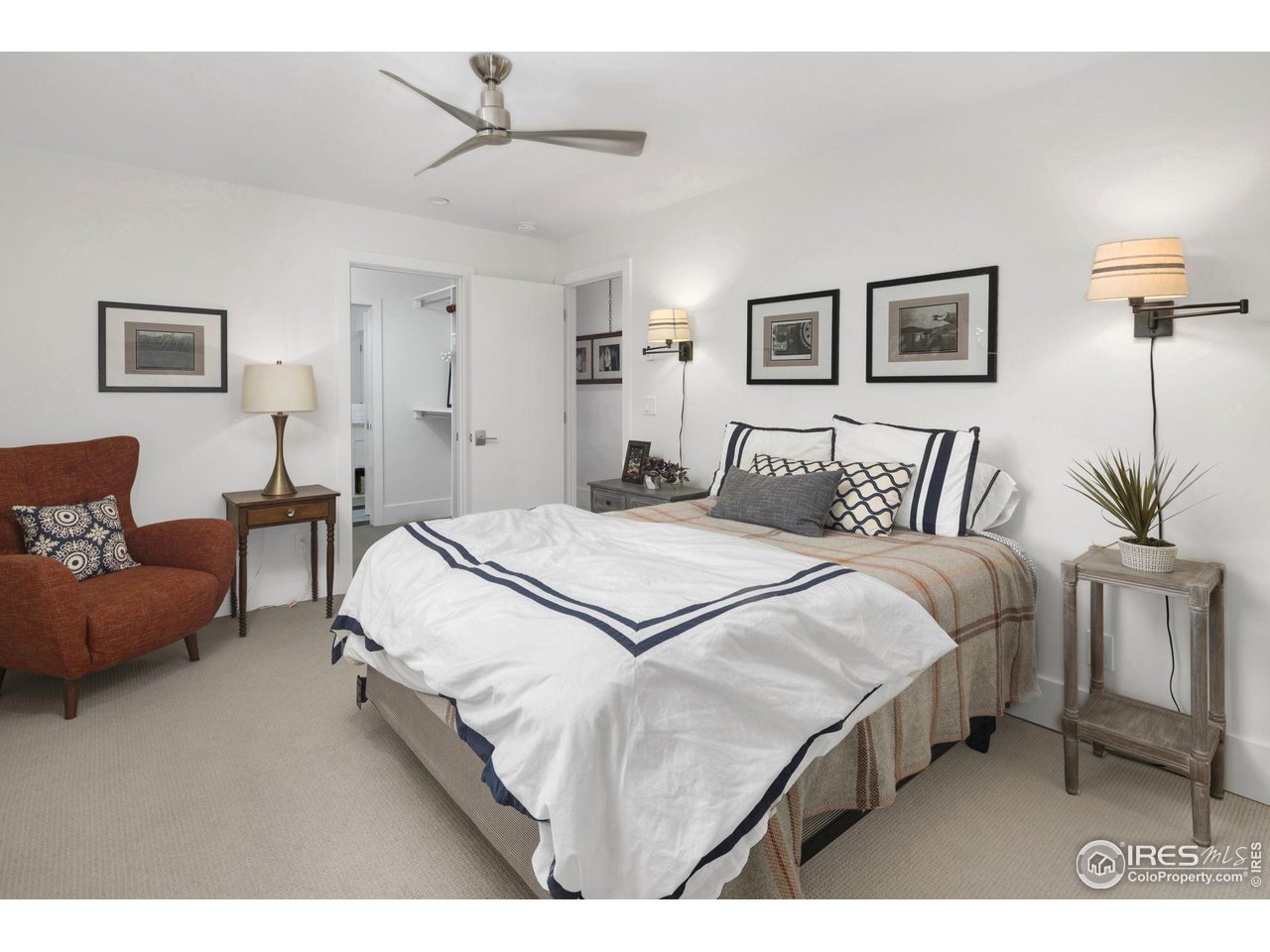 3858 57th Street Boulder, CO 80301 - Photo 22 of 39 a bedroom with a bed and a couch