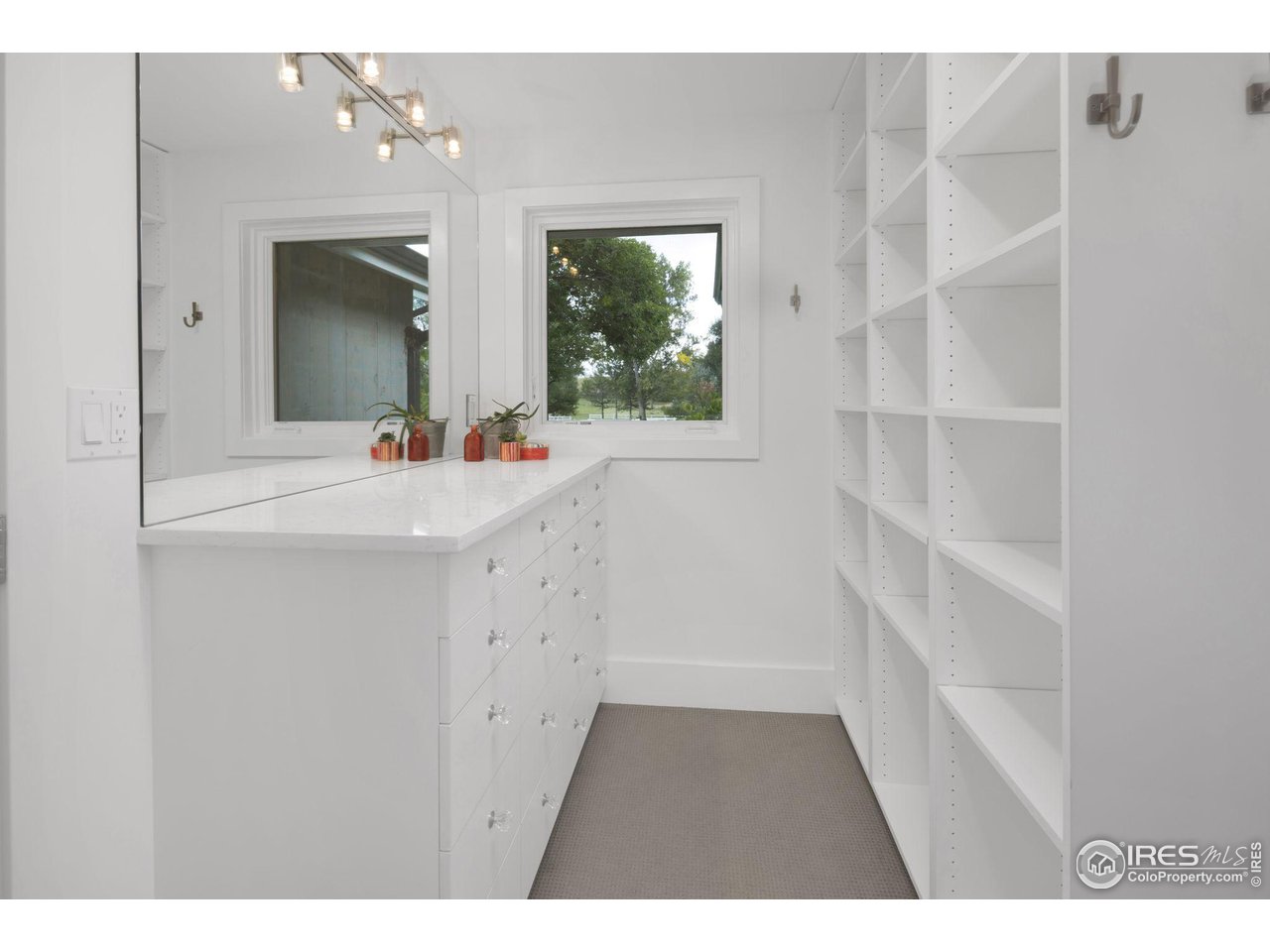 3858 57th Street Boulder, CO 80301 - Photo 24 of 39 a bathroom with a sink and a mirror