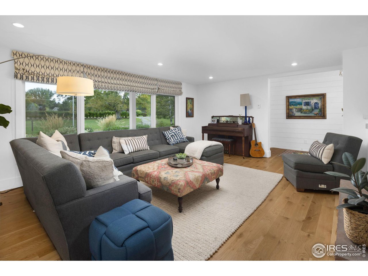 3858 57th Street Boulder, CO 80301 - Photo 10 of 39 a living room with furniture and a large window