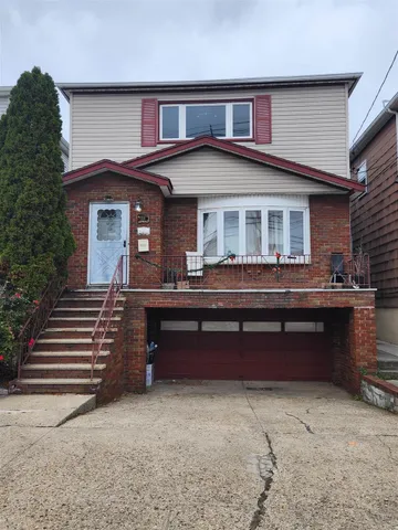 a front view of house with yard