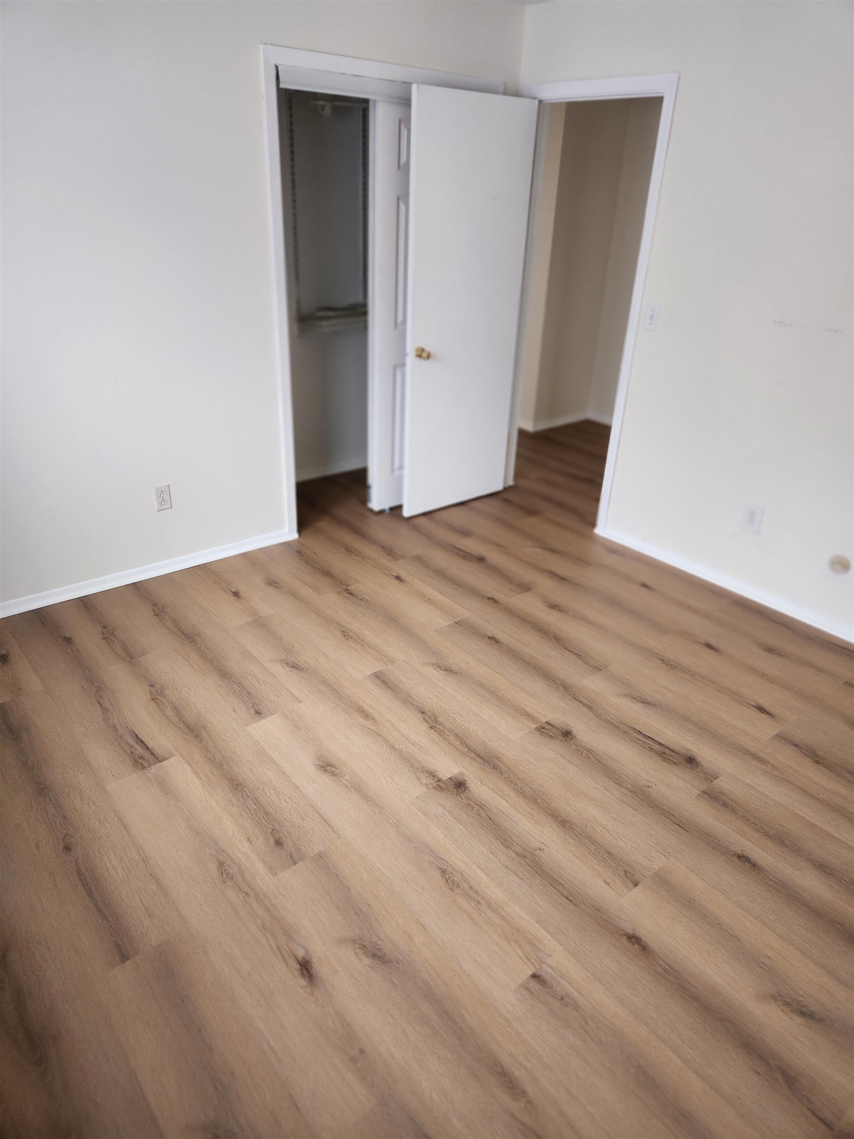 71 Linnet Street, Unit 2 Bayonne, NJ 07002 - Photo 18 of 18 an empty room with wooden floor