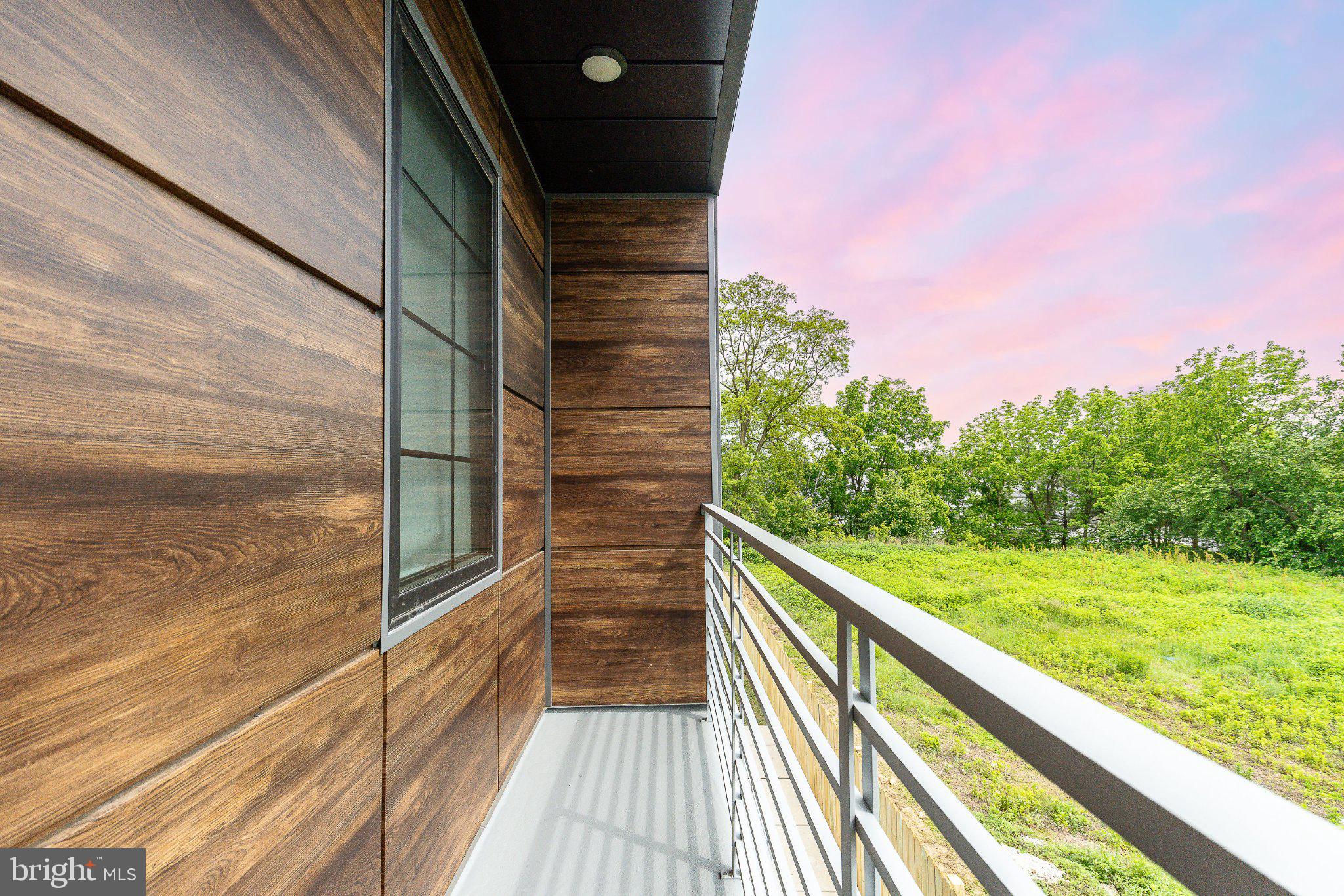 9739 Krewstown Road Philadelphia, PA 19115 - Photo 44 of 84 Serene balcony with lush green views.