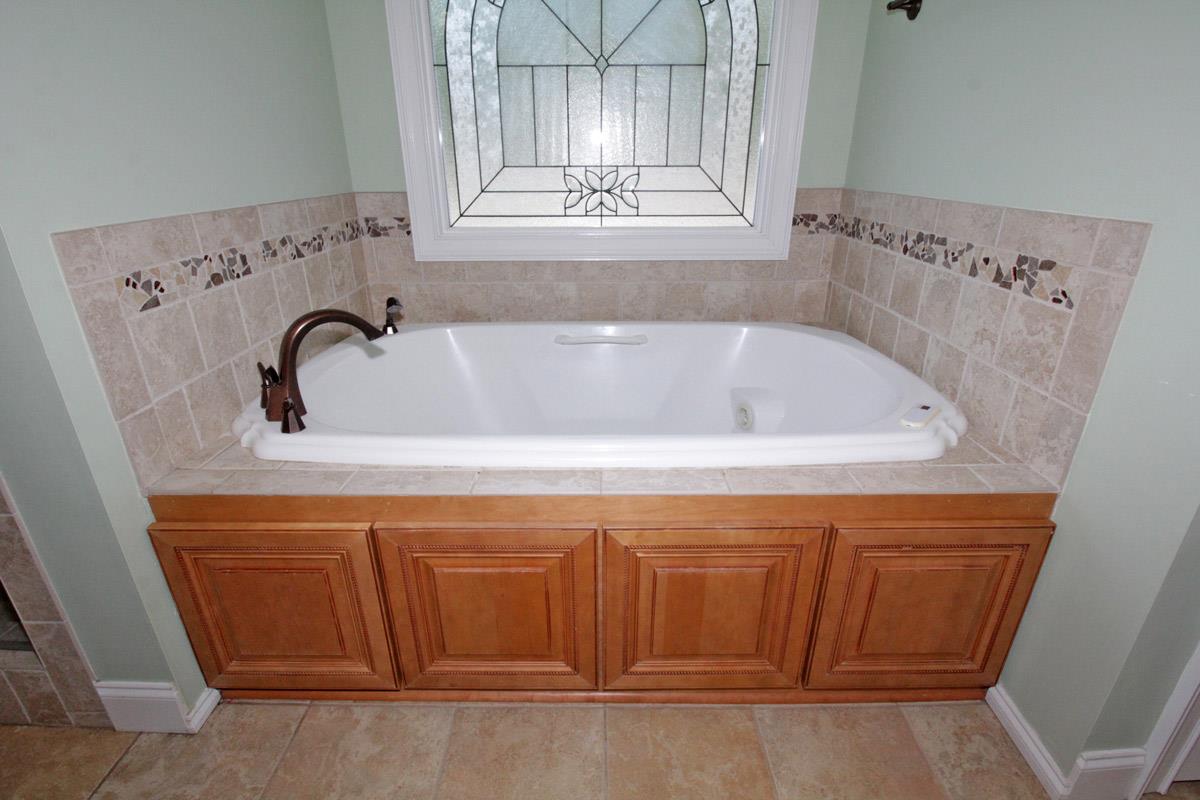 4845 Starks Road Cross Plains, TN 37049 - Photo 13 of 27 a bathroom with a sink and a mirror