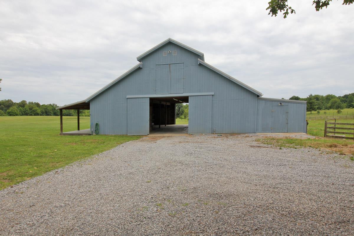 4845 Starks Road Cross Plains, TN 37049 - Photo 19 of 27 a view of an house with backyard and garden
