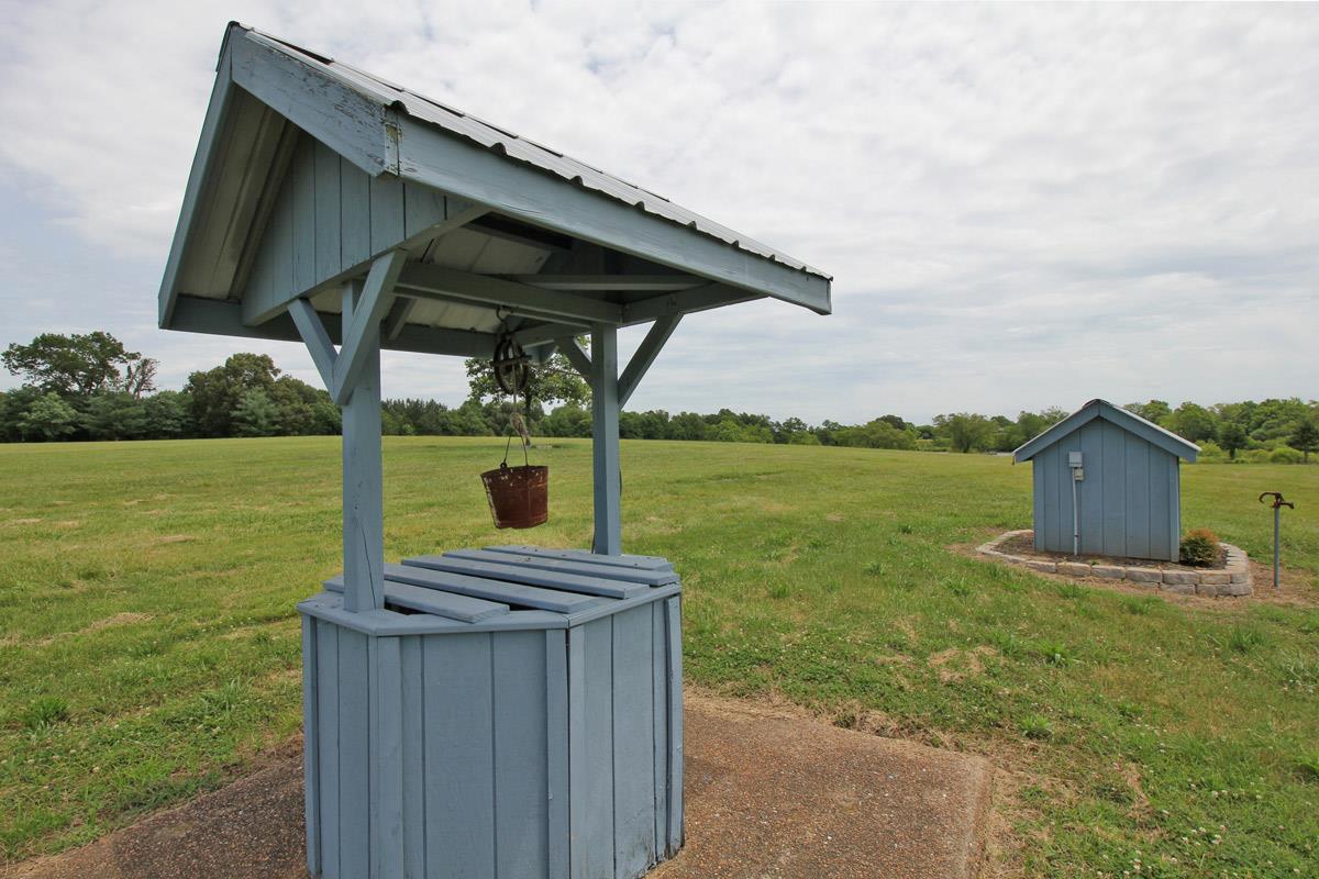 4845 Starks Road Cross Plains, TN 37049 - Photo 25 of 27 a view of a wooden deck and a yard