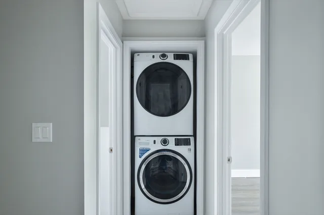 a utility room with dryer and washer