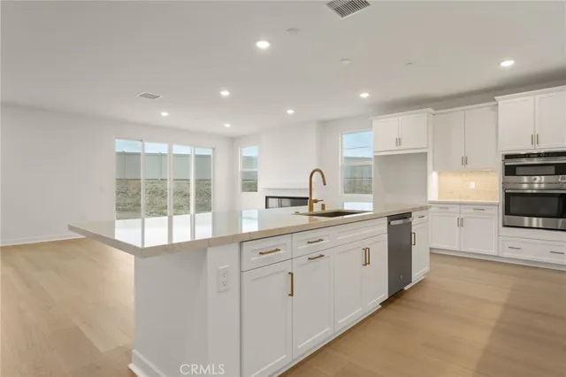 a large kitchen with cabinets