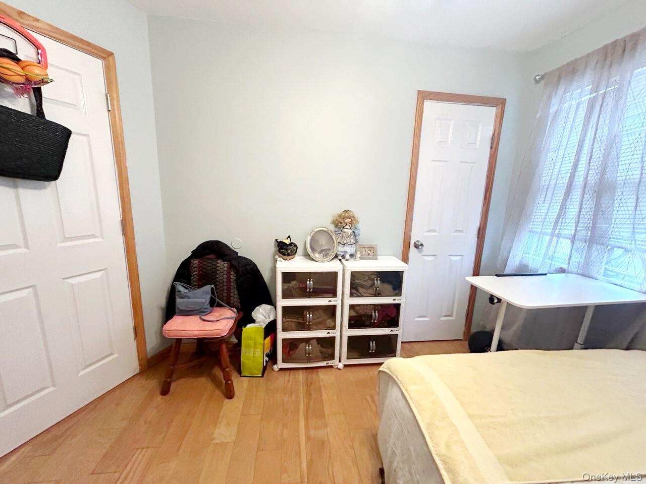 60 Aloma Road Rocky Point, NY 11778 - Photo 4 of 34 Bedroom featuring light wood-type flooring