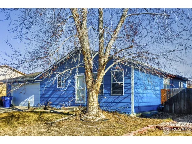 a view of swimming pool with a yard