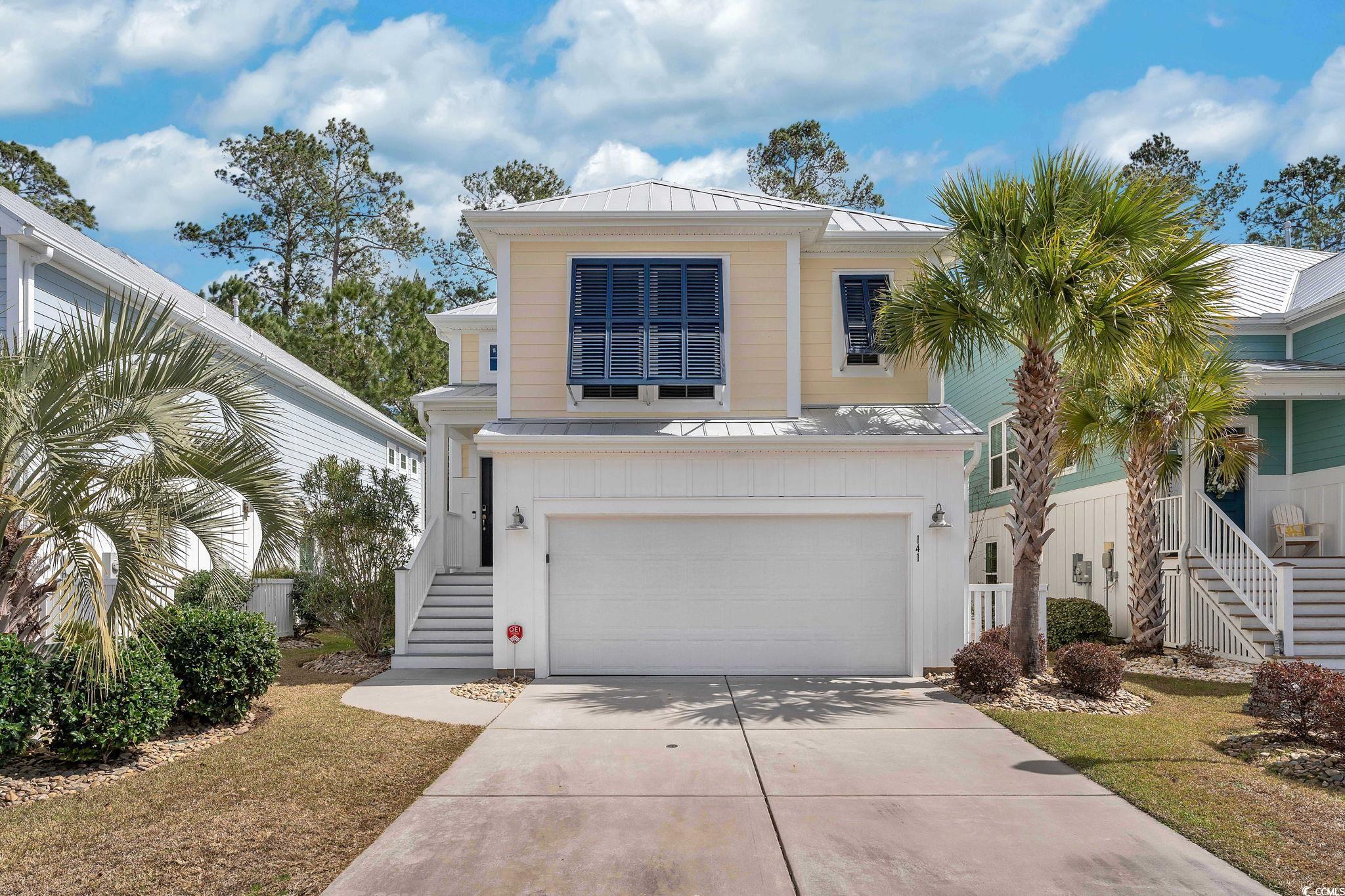 141 Splendor Circle Murrells Inlet, SC 29576 - Photo 1 of 34 View of front of property with metal roof, an atta