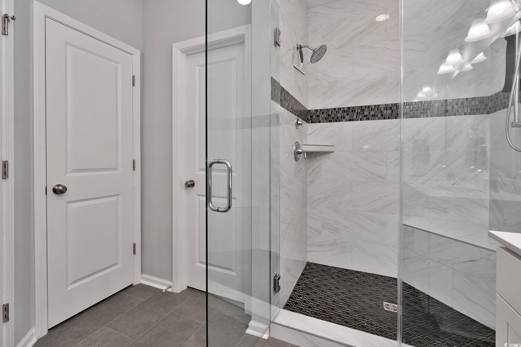 141 Splendor Circle Murrells Inlet, SC 29576 - Photo 19 of 34 Full bathroom featuring a stall shower, vanity, an