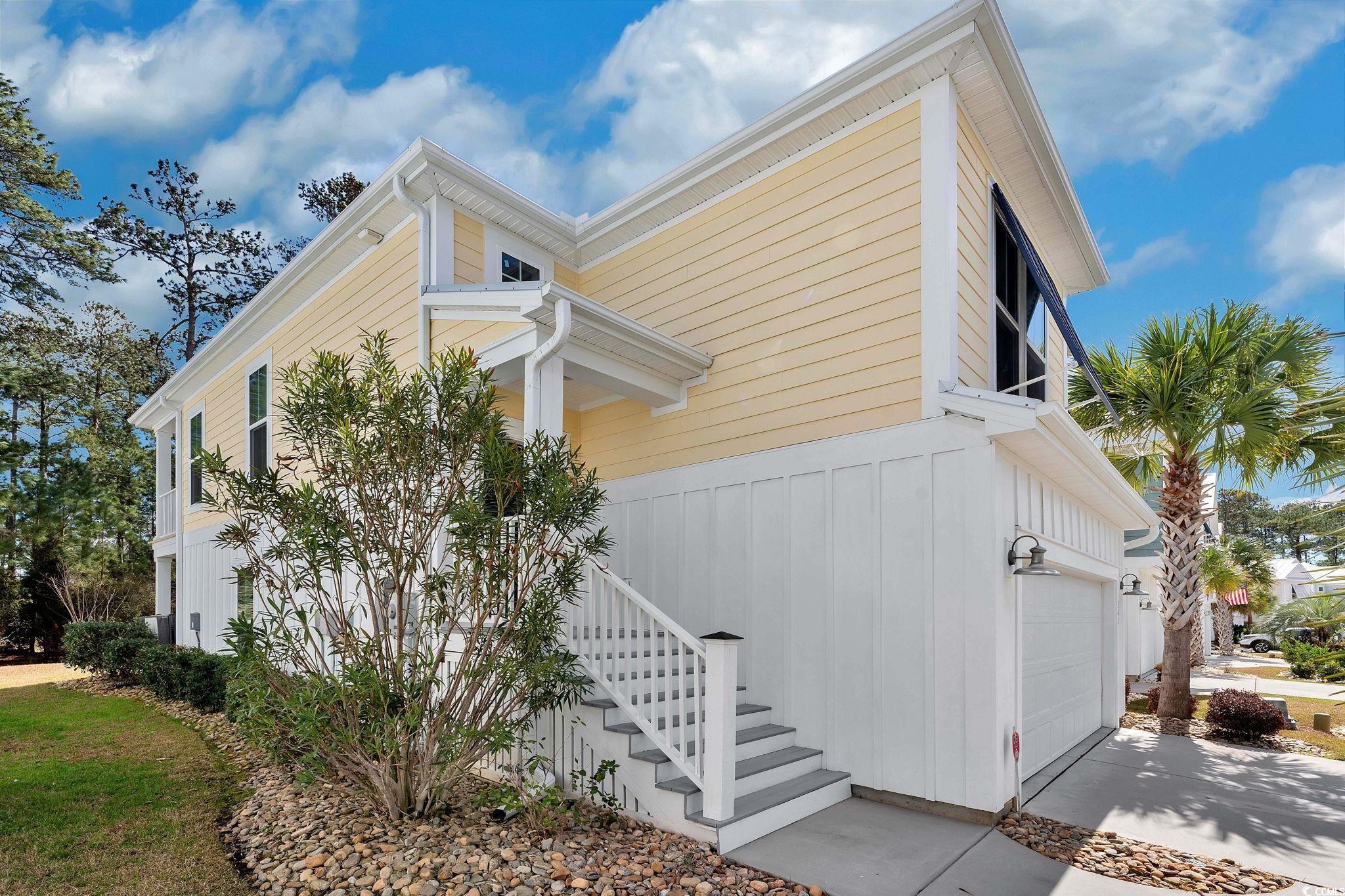141 Splendor Circle Murrells Inlet, SC 29576 - Photo 33 of 34 View of home's exterior with an attached garage an