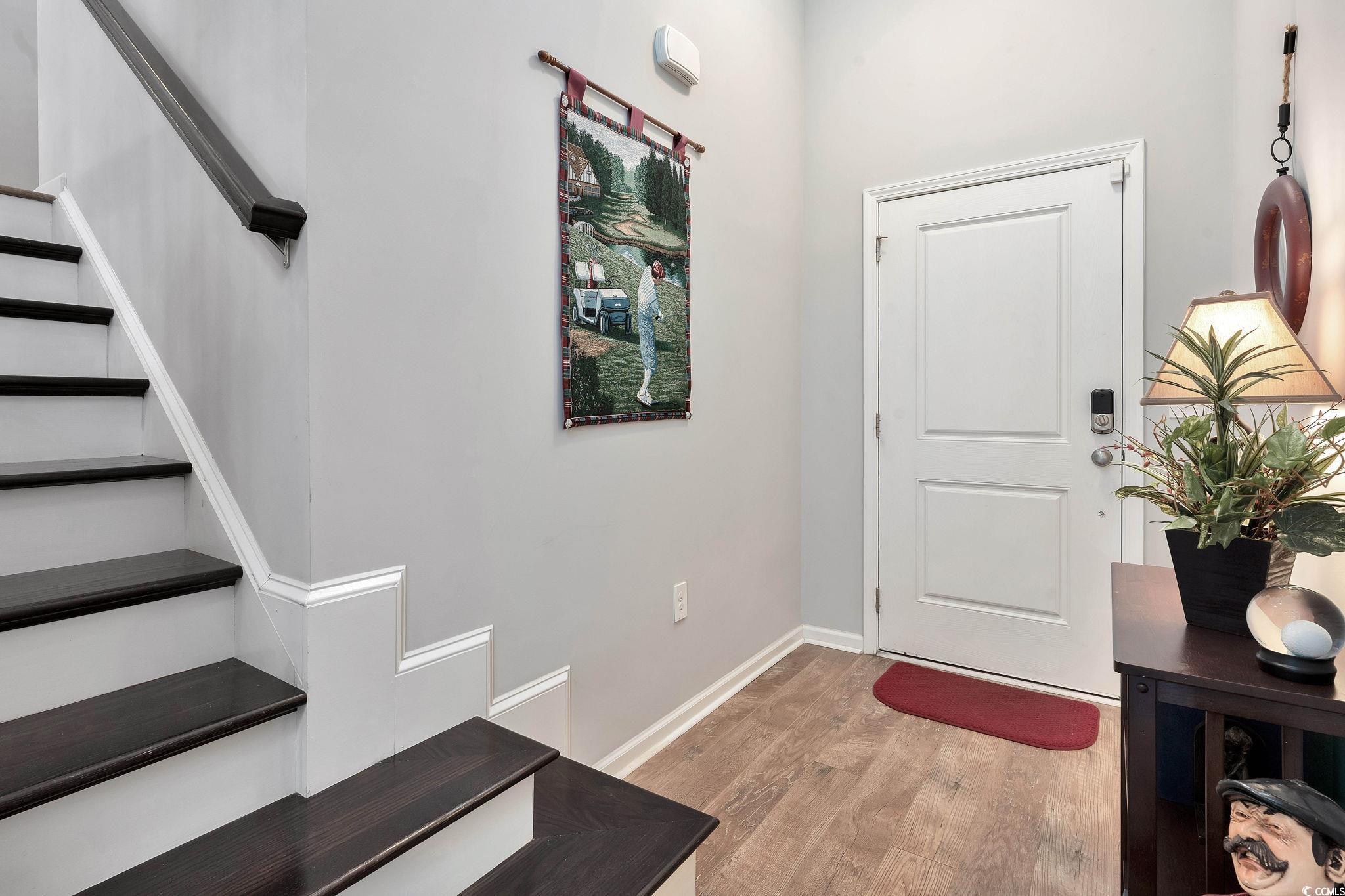 141 Splendor Circle Murrells Inlet, SC 29576 - Photo 4 of 34 Foyer entrance featuring wood finished floors, bas