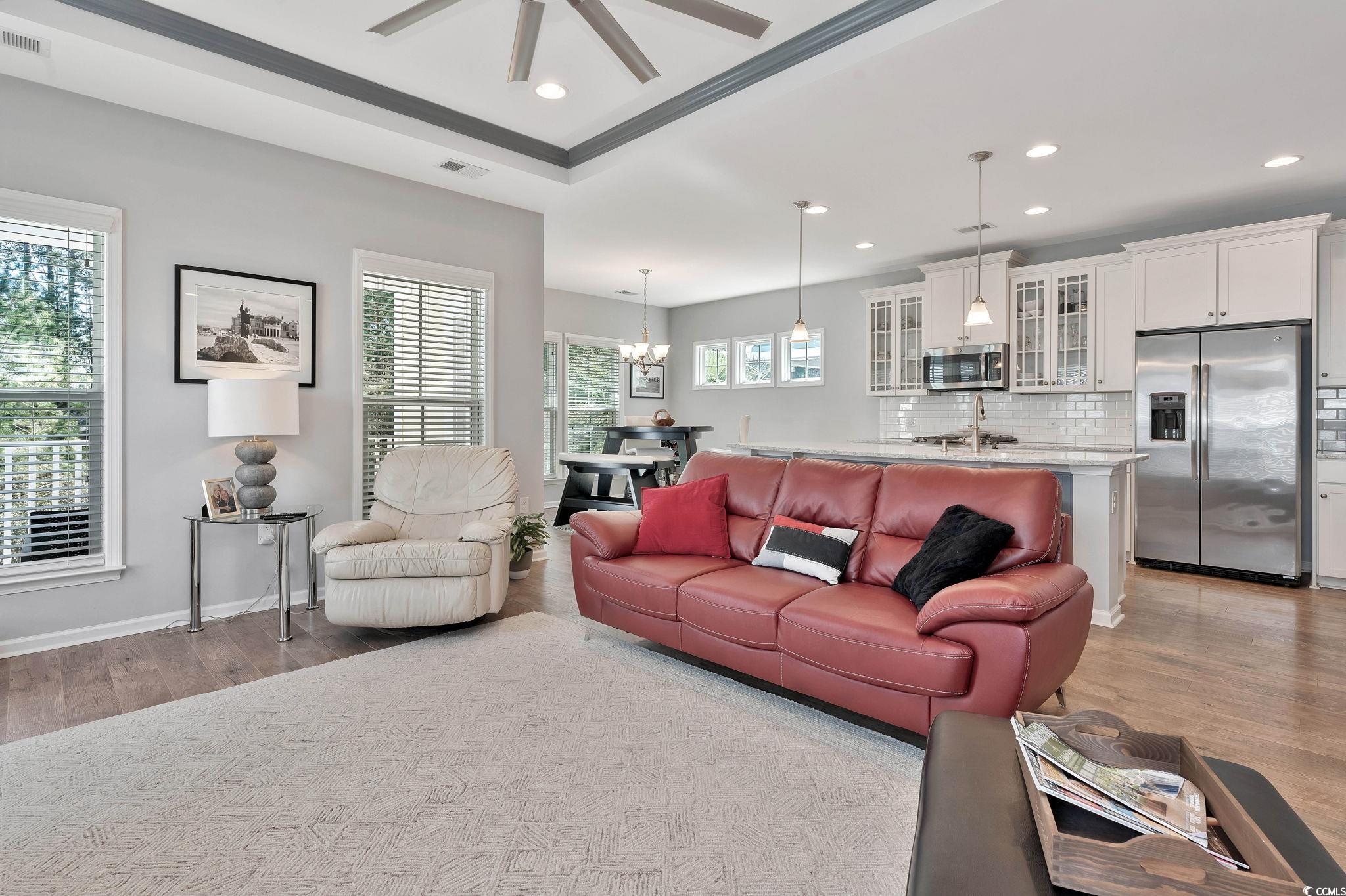 141 Splendor Circle Murrells Inlet, SC 29576 - Photo 7 of 34 Living area featuring light wood-type flooring, a