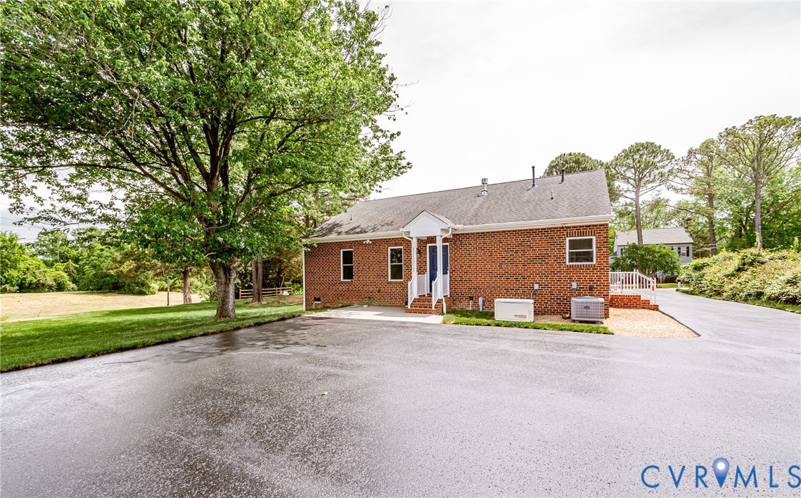 2018 Valentine Road Henrico, VA 23228 - Photo 51 of 65 a view of a house with backyard and a tree