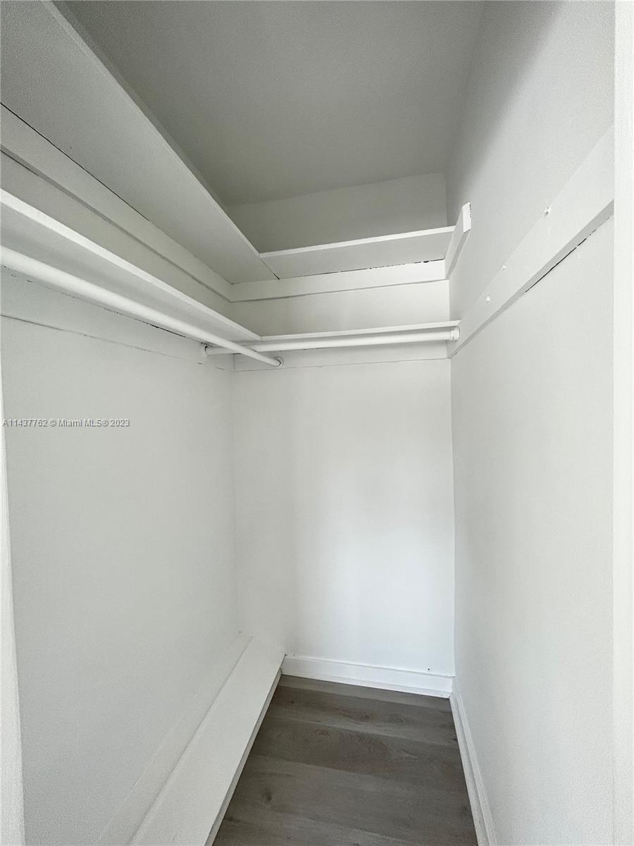875 80th Street, Unit 3 Miami Beach, FL 33141 - Photo 14 of 15 a view of an empty walk in closet