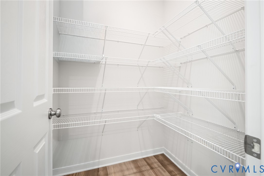 11348 Benton Pointe Way Chester, VA 23831 - Photo 22 of 45 a view of an empty walk in closet
