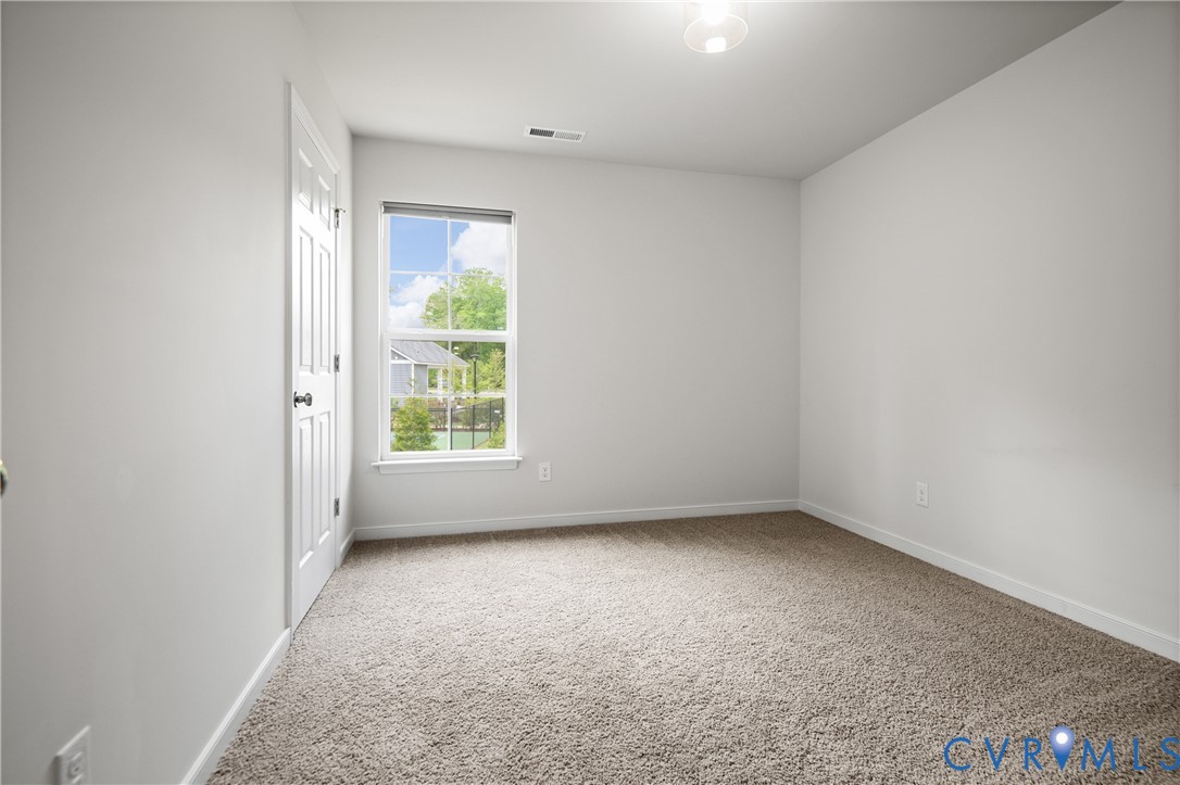 11348 Benton Pointe Way Chester, VA 23831 - Photo 34 of 45 an empty room with a window