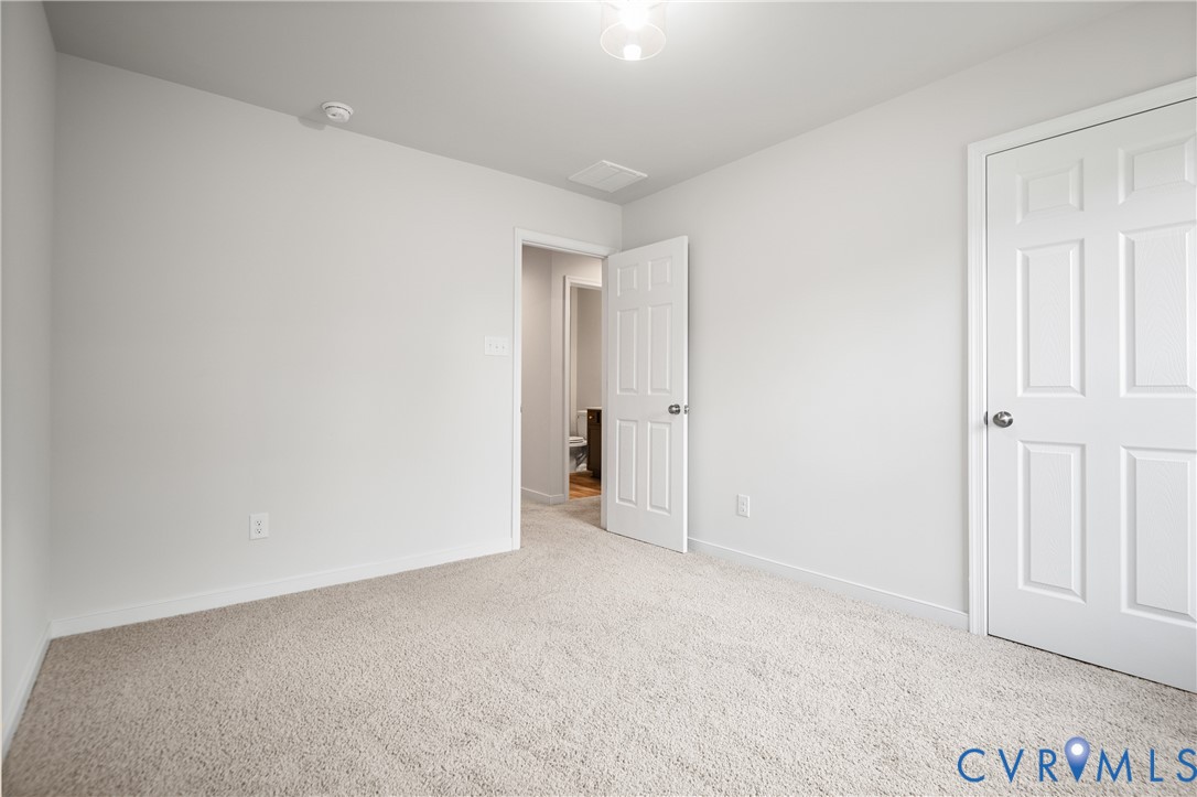 11348 Benton Pointe Way Chester, VA 23831 - Photo 35 of 45 a view of an empty room
