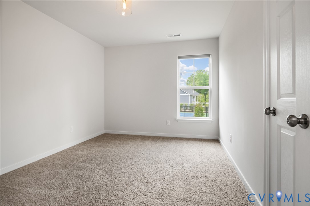 11348 Benton Pointe Way Chester, VA 23831 - Photo 36 of 45 an empty room with a window