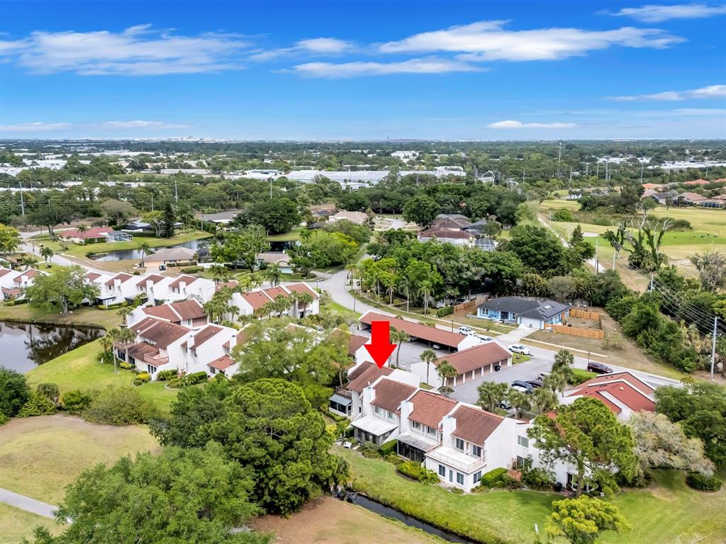 7581 Cumberland Road, Unit 7 Seminole, FL 33777 - Photo 46 of 68 an aerial view of residential houses with outdoor space