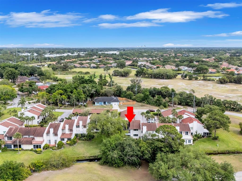 7581 Cumberland Road, Unit 7 Seminole, FL 33777 - Photo 47 of 68 an aerial view of residential houses with outdoor space and ocean