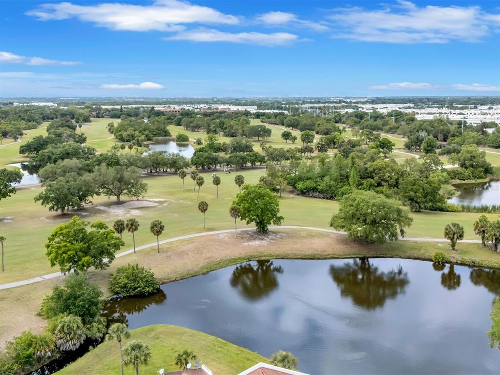 7581 Cumberland Road, Unit 7 Seminole, FL 33777 - Photo 51 of 68 an aerial view of a residential houses with outdoor space