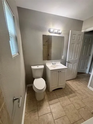 a view of outdoor space with deck and yard