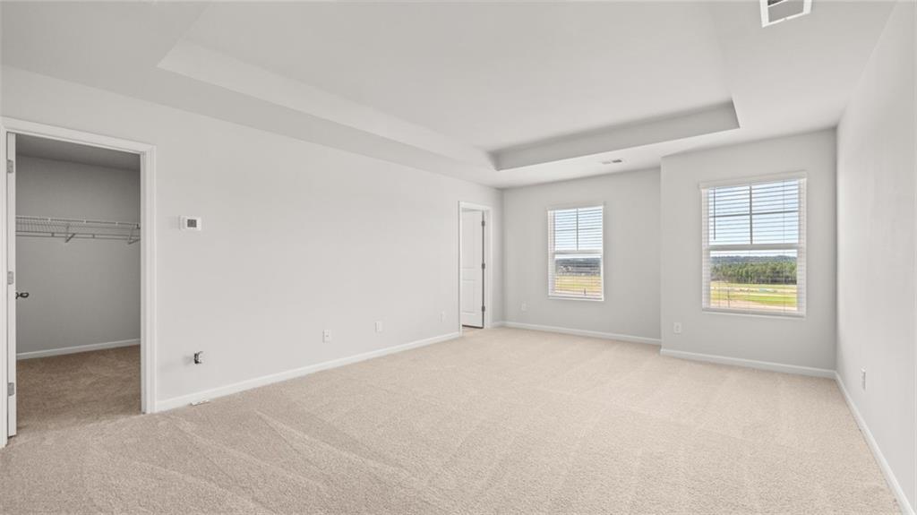 177 Lauritsen Way Newnan, GA 30265 - Photo 16 of 37 an empty room with windows
