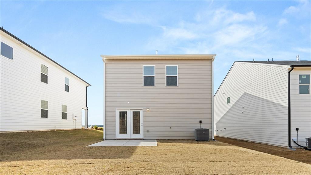 177 Lauritsen Way Newnan, GA 30265 - Photo 36 of 37 a view of a house with a backyard