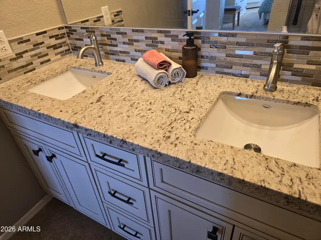 a bath room with a sink