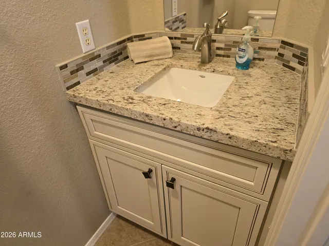a view of a kitchen from the hallway