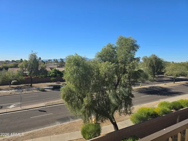 a balcony with street view