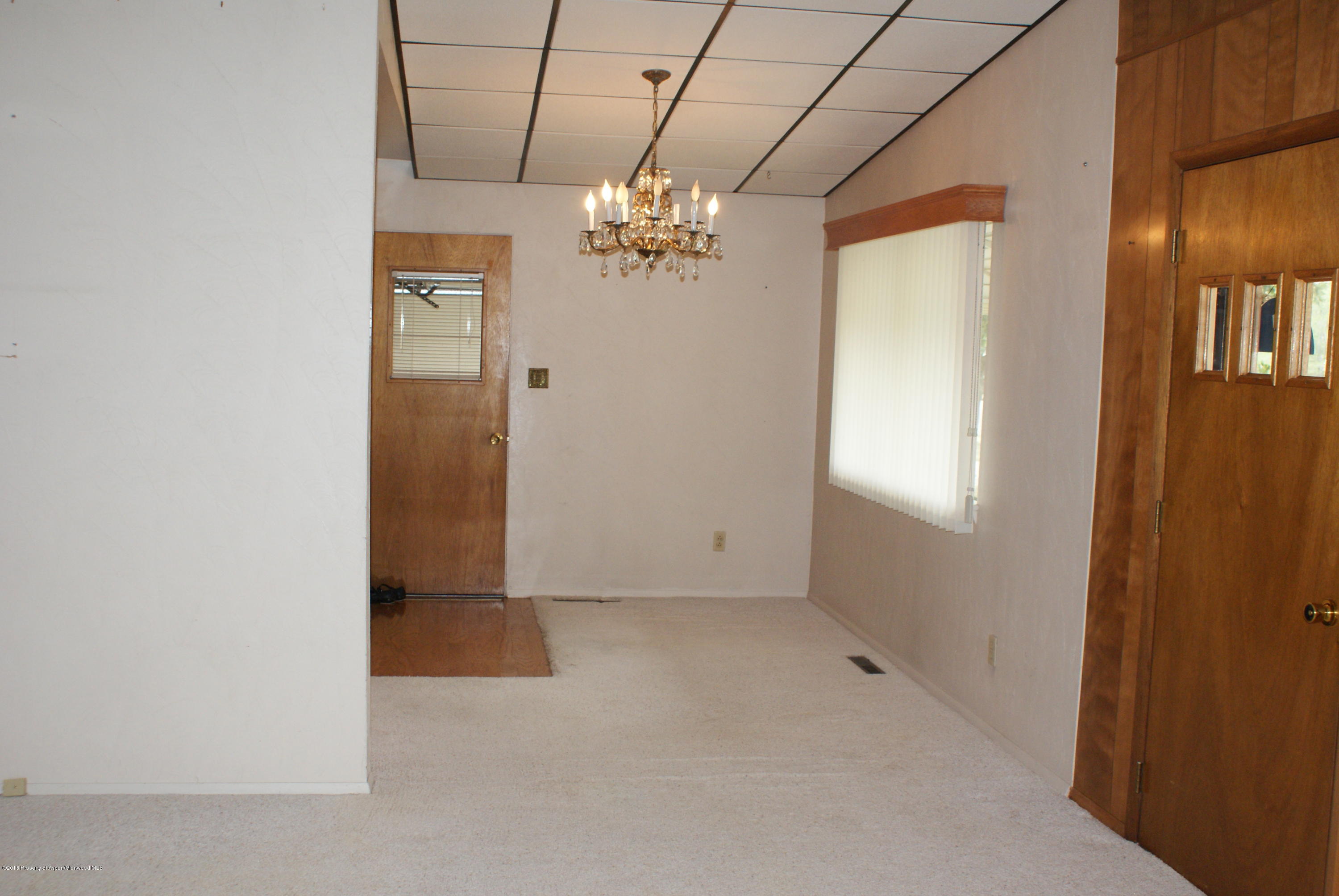 337 Prefontaine Avenue Rifle, CO 81650 - Photo 3 of 15 a view of an empty room with a window
