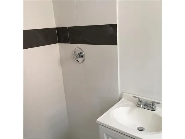 a bathroom with a toilet and a sink