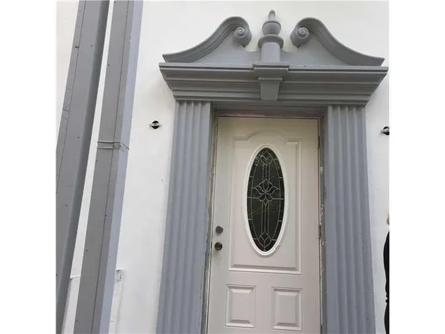 a view of a sink with washer and dryer